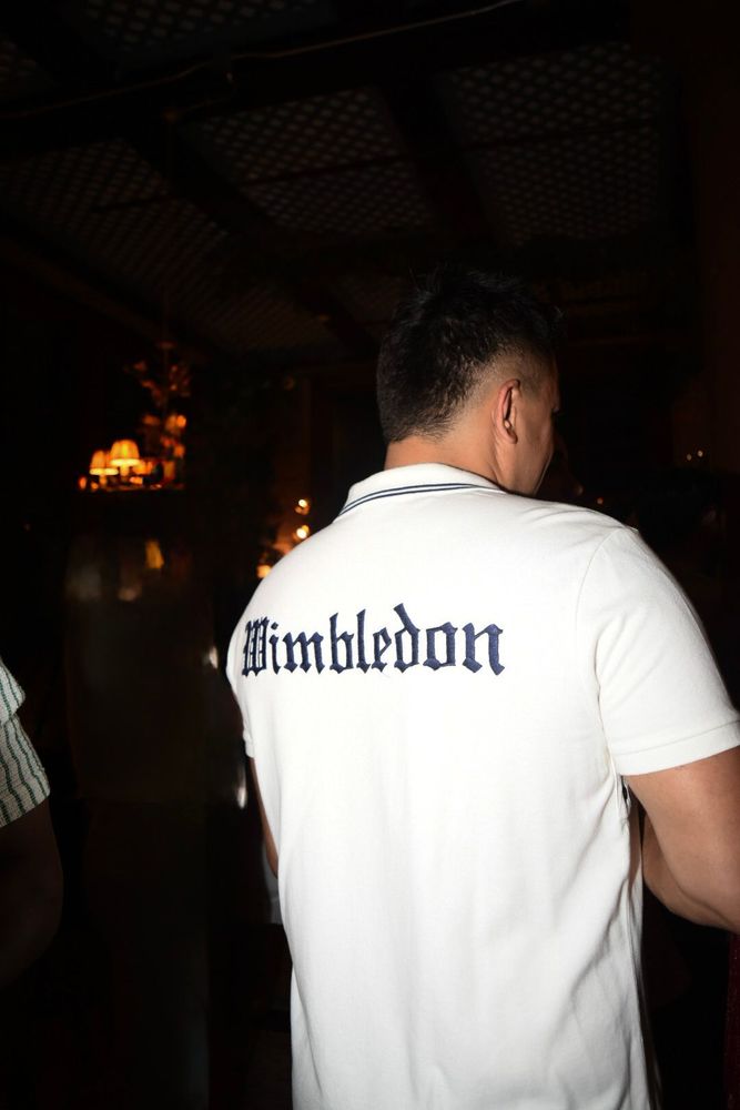 Guests embraced the tennis spirit with apparel referencing Wimbledon