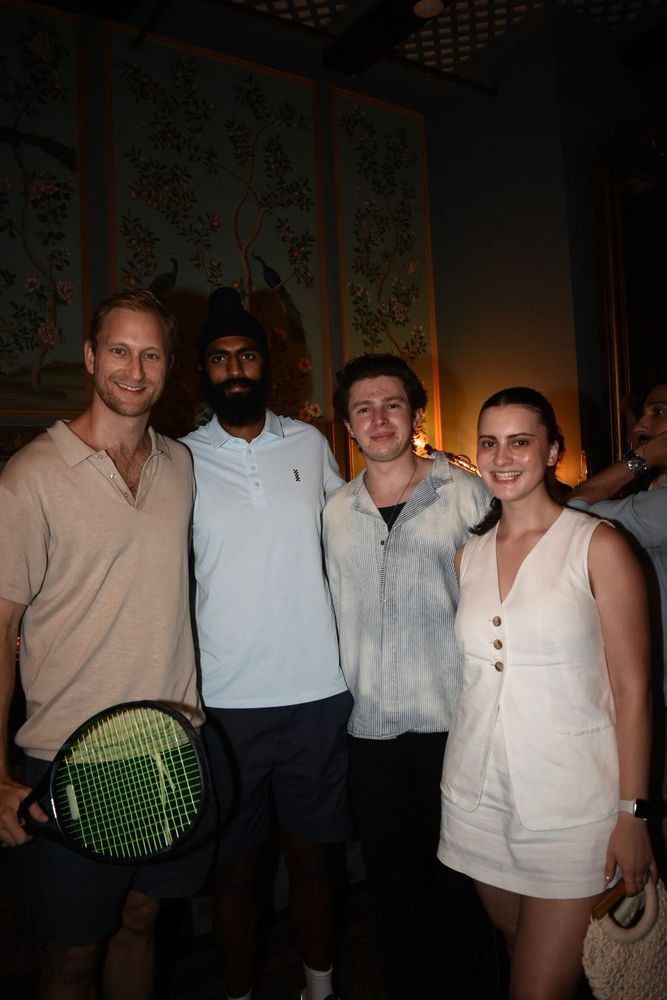 Rackets in hand brought a playful edge to the night’s atmosphere.