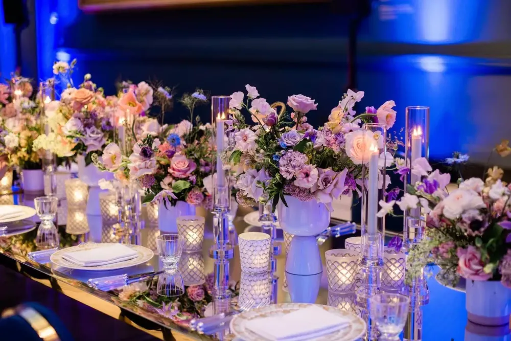Elegant dinner flowers for an event at the Victoria and Albert Museum by Larry Walshe Studios