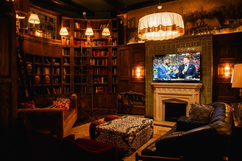 One of Maxwell’s viewing rooms set for the game, blending comfort with character.