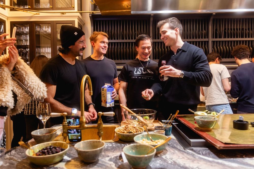 Bryan Johnson hosting a mini-cooking competition in Maxwell's Grand Kitchen
