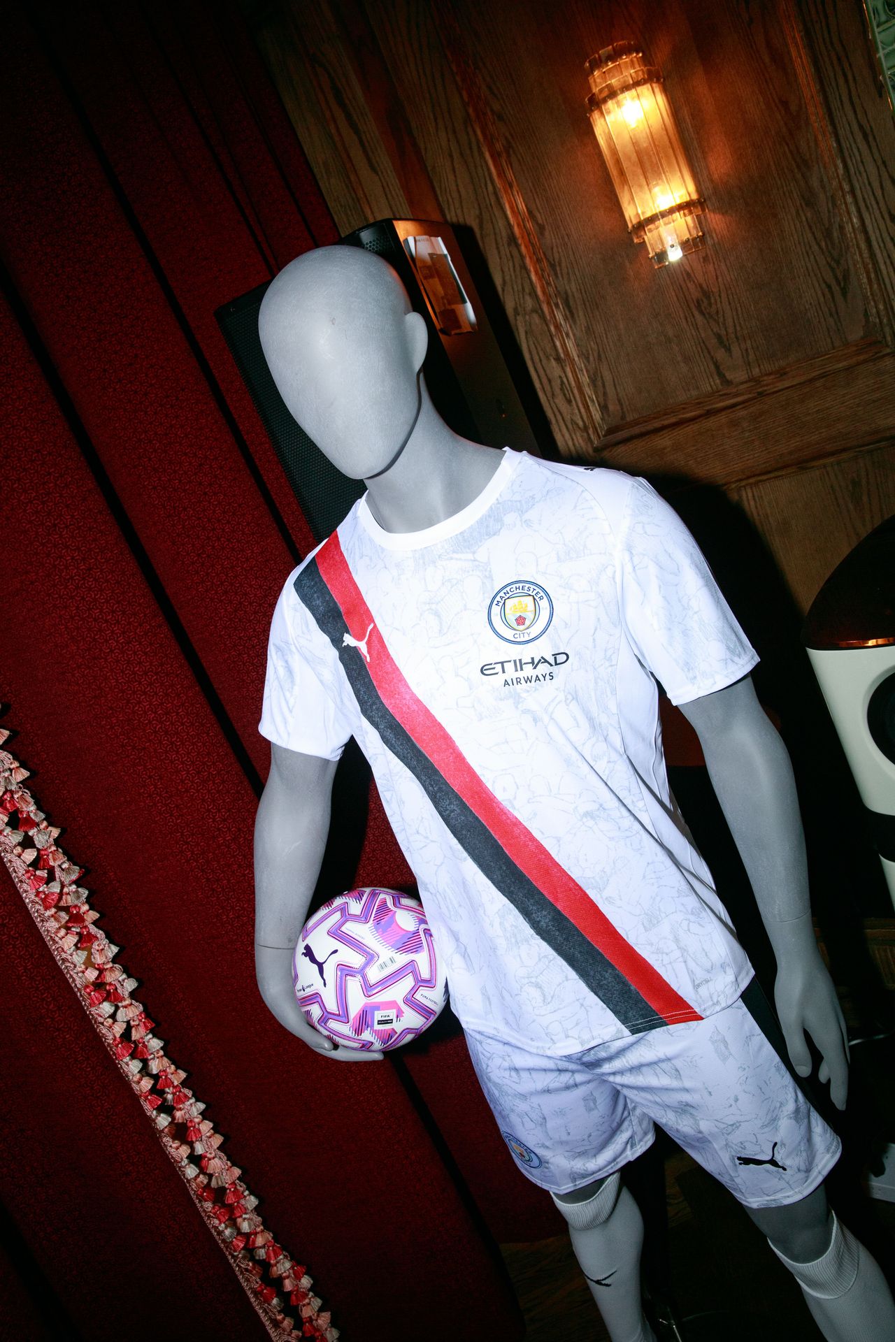 Even the doll showed up in Manchester City colors.