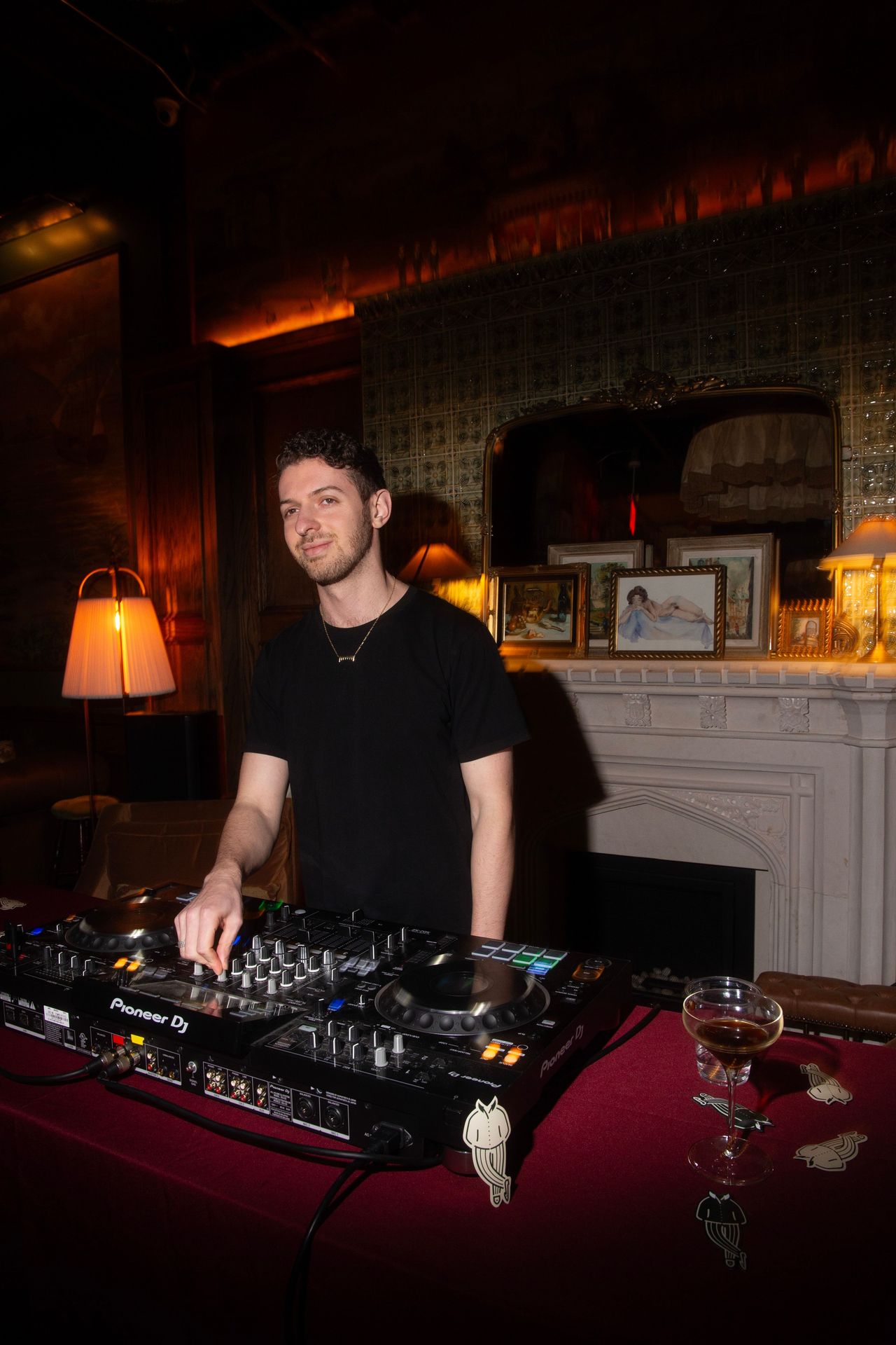 DJ setting the tone for the night with a mix that kept the energy high