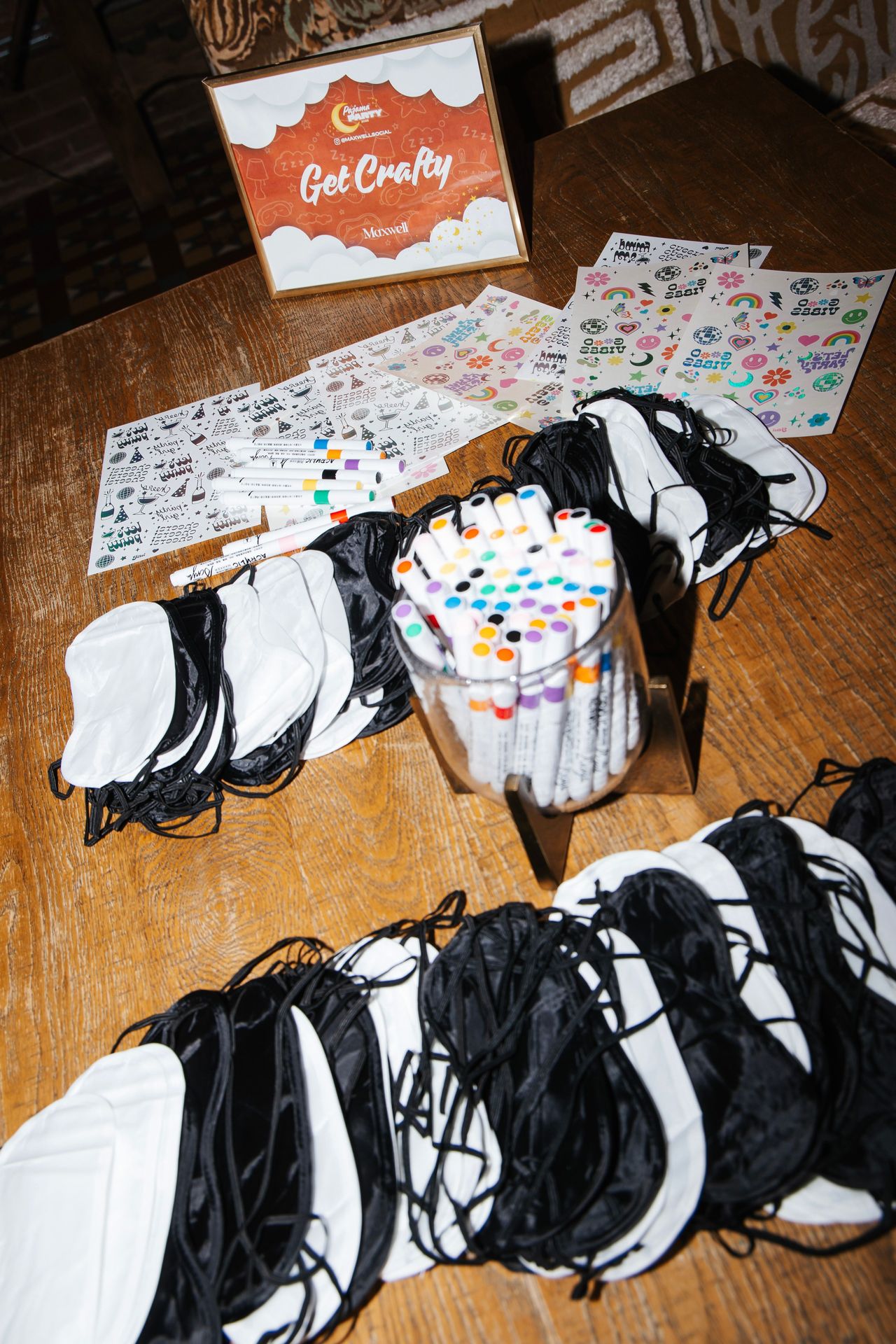 Guests designed their own sleep masks with markers and temporary tattoos to put on