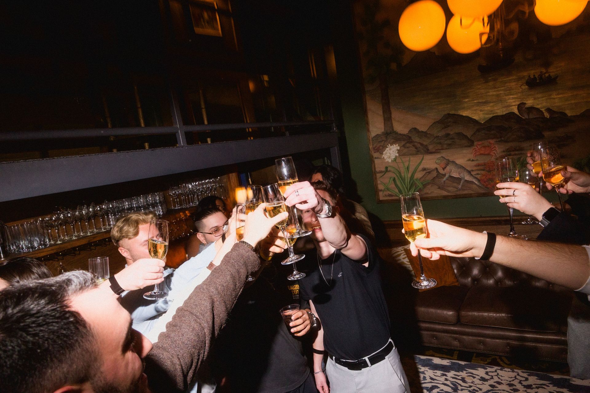 A celebratory toast bringing guests together in the middle of the room