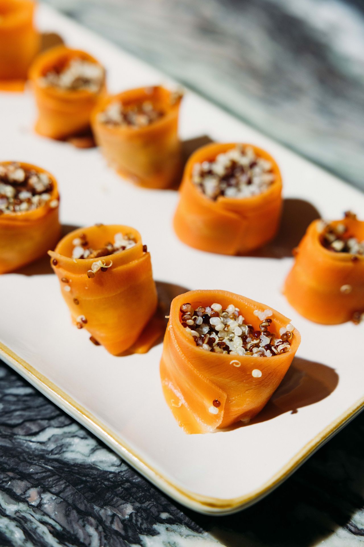 Seasonal bites made the rounds as guests sipped on Laura and Cherry-themed cocktails