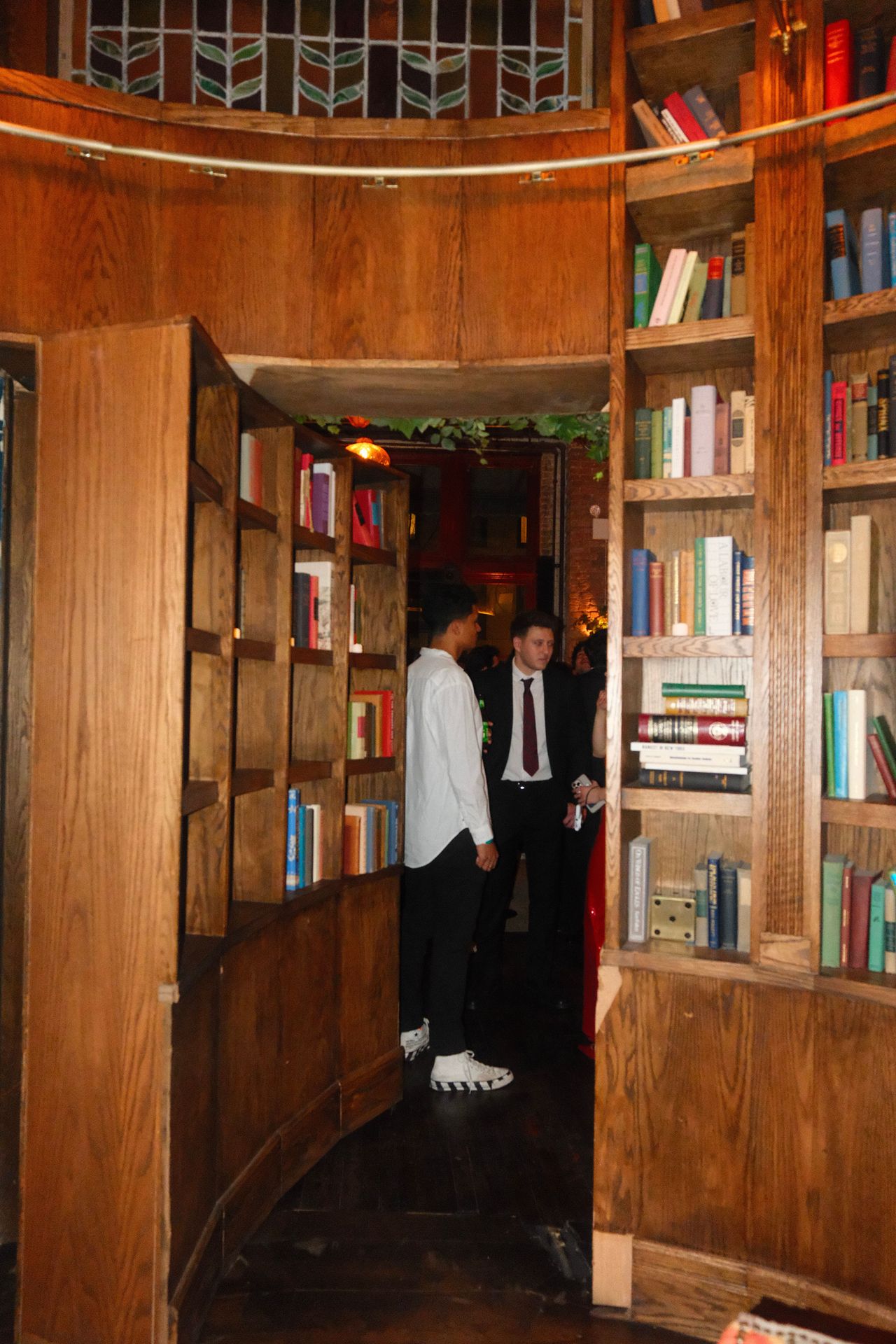 Maxwell’s secret library door, where cartoonists and members disappear into conversation, and maybe a few hidden jokes