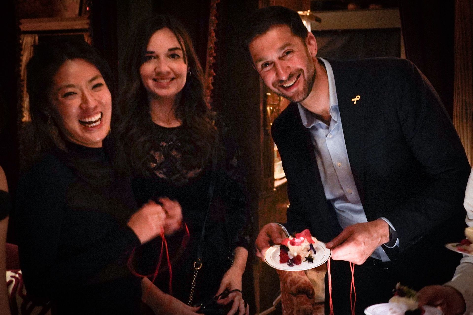 Smiles all around as desserts are plated and shared
