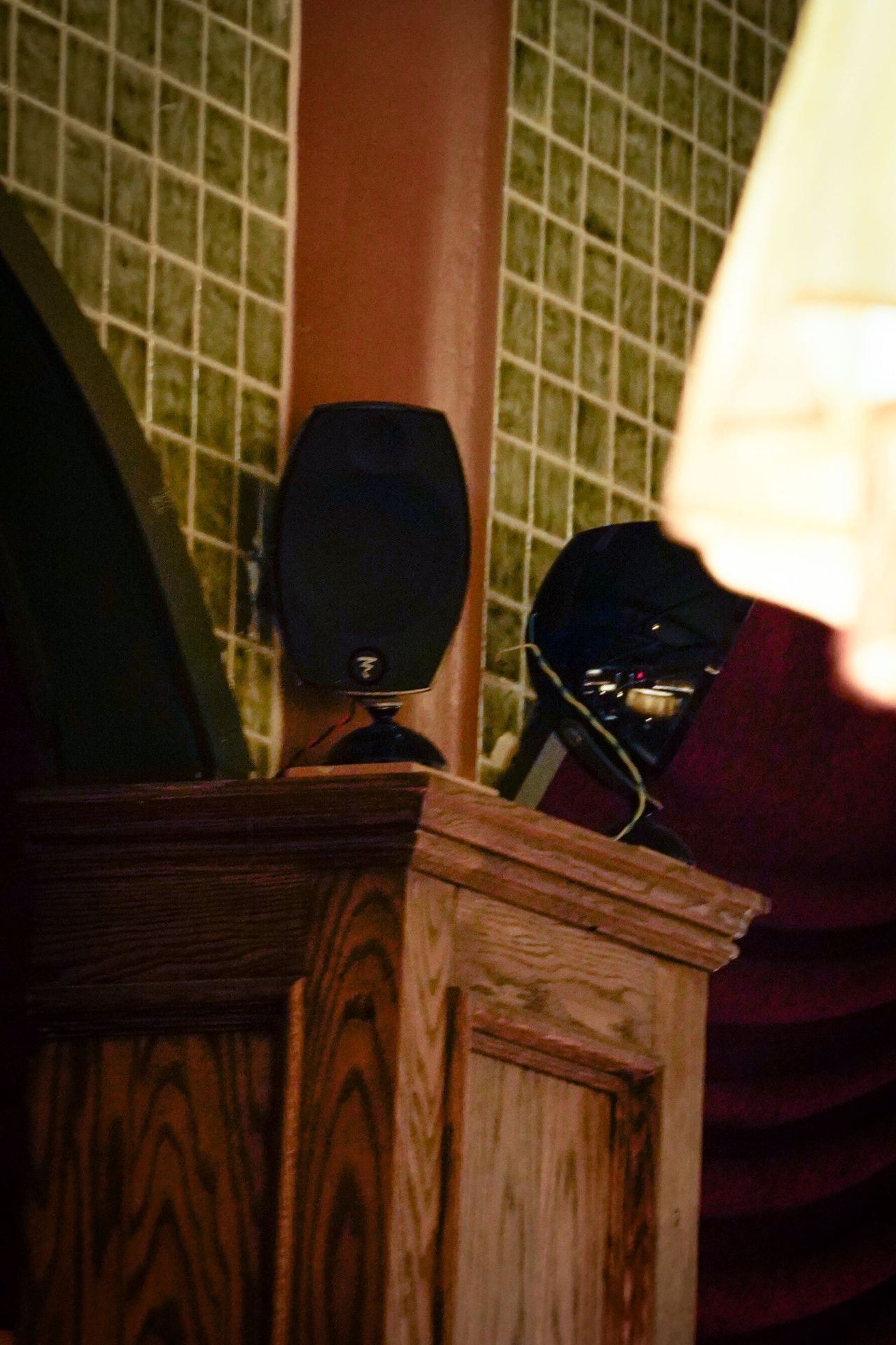 Focal Sib Evo speakers on wooden columns at Maxwell, showcasing the strategic placement that ensures even sound distribution throughout the club's elegant interior spaces.