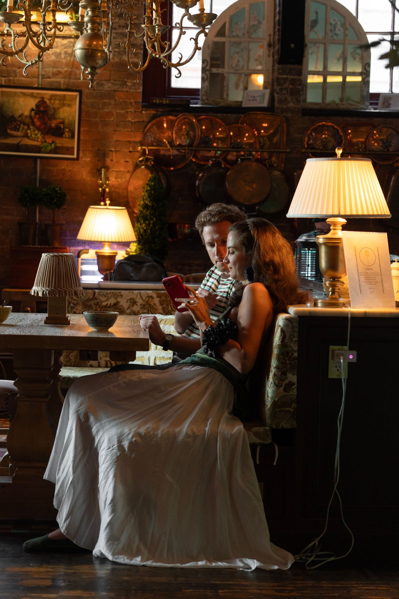 A quiet corner, a shared moment at Maxwell where the energy of the city meets the calm of conversation