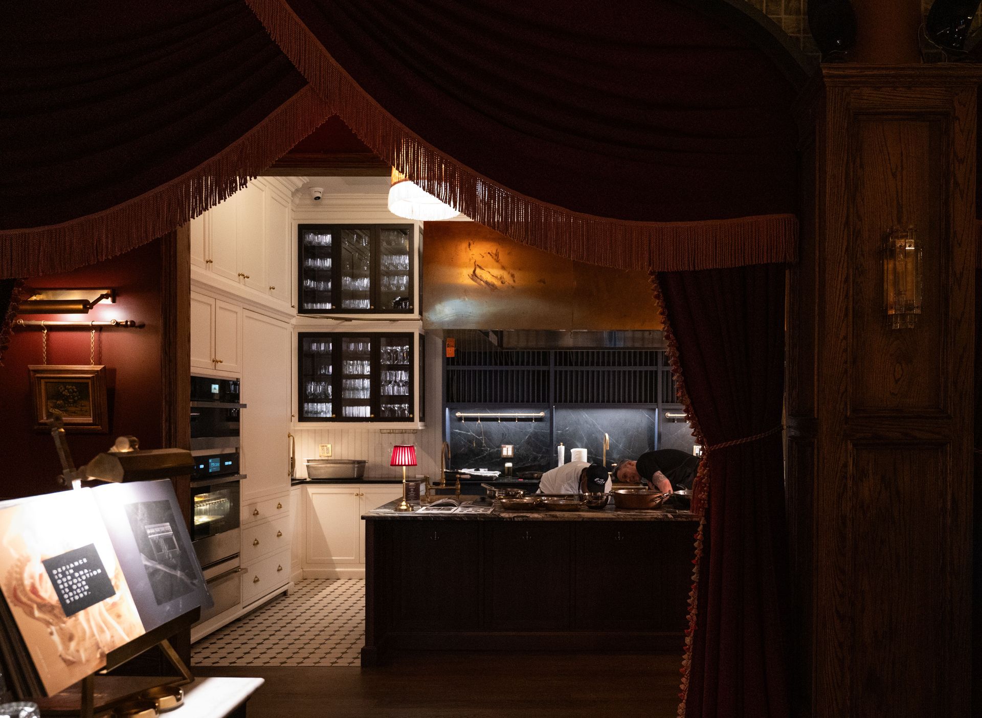 Behind the velvet curtain: JennAir’s professional-grade appliances at the center ready for a live demonstration