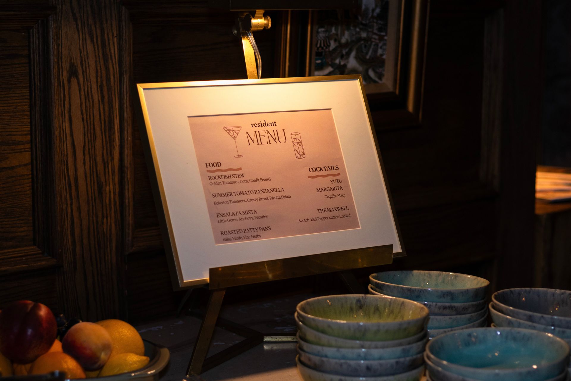 The evening's carefully curated menu displayed on an elegant stand