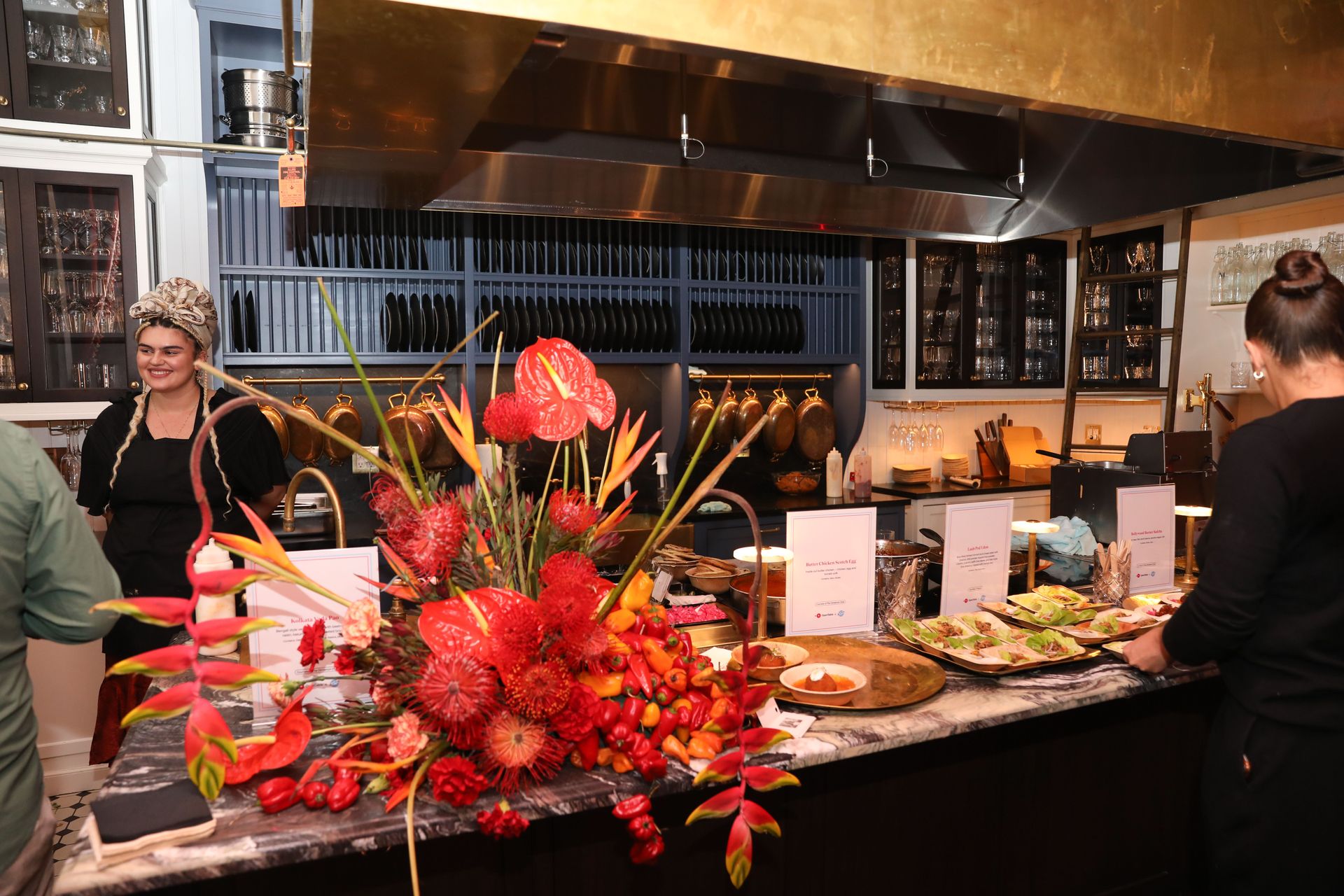 Maxwell’s Grand Kitchen came alive with vibrant florals and interactive chef stations